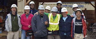group photo of ReStore staff at Glisan Gardens build