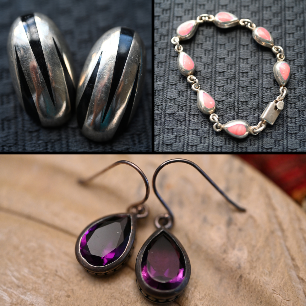 Black striped metal earrings, pink gem bracelet, and purple jewel drop earrings